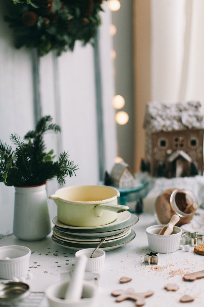 about-01 Rustic kitchen table with holiday decor and baking ingredients.